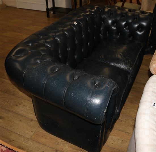 A dark green buttoned leather Chesterfield, W.166cm
